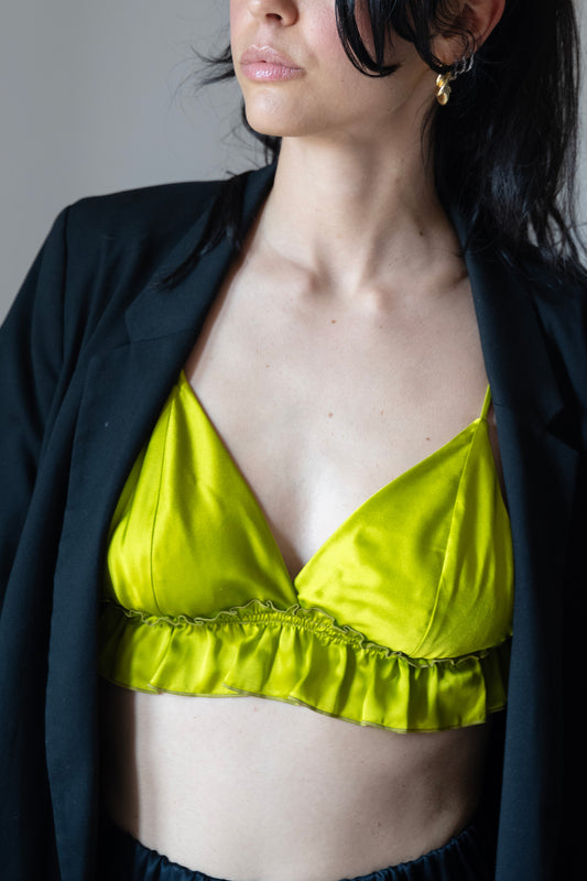 Top Memphis variante verde olio