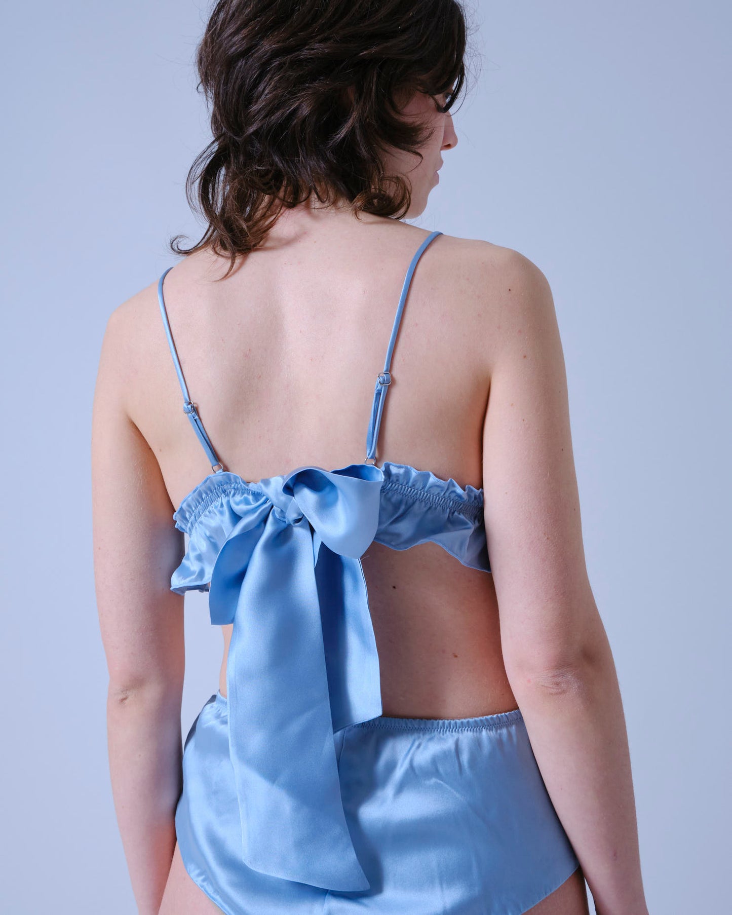 Top Memphis variante azzurro pastello