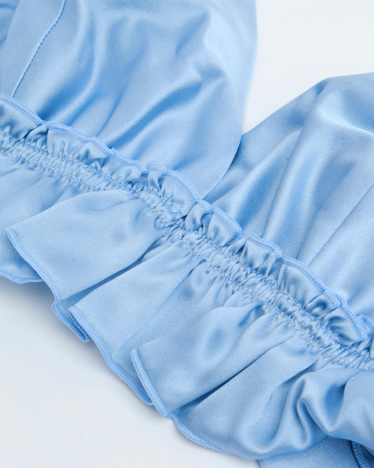 Top Memphis variante azzurro pastello