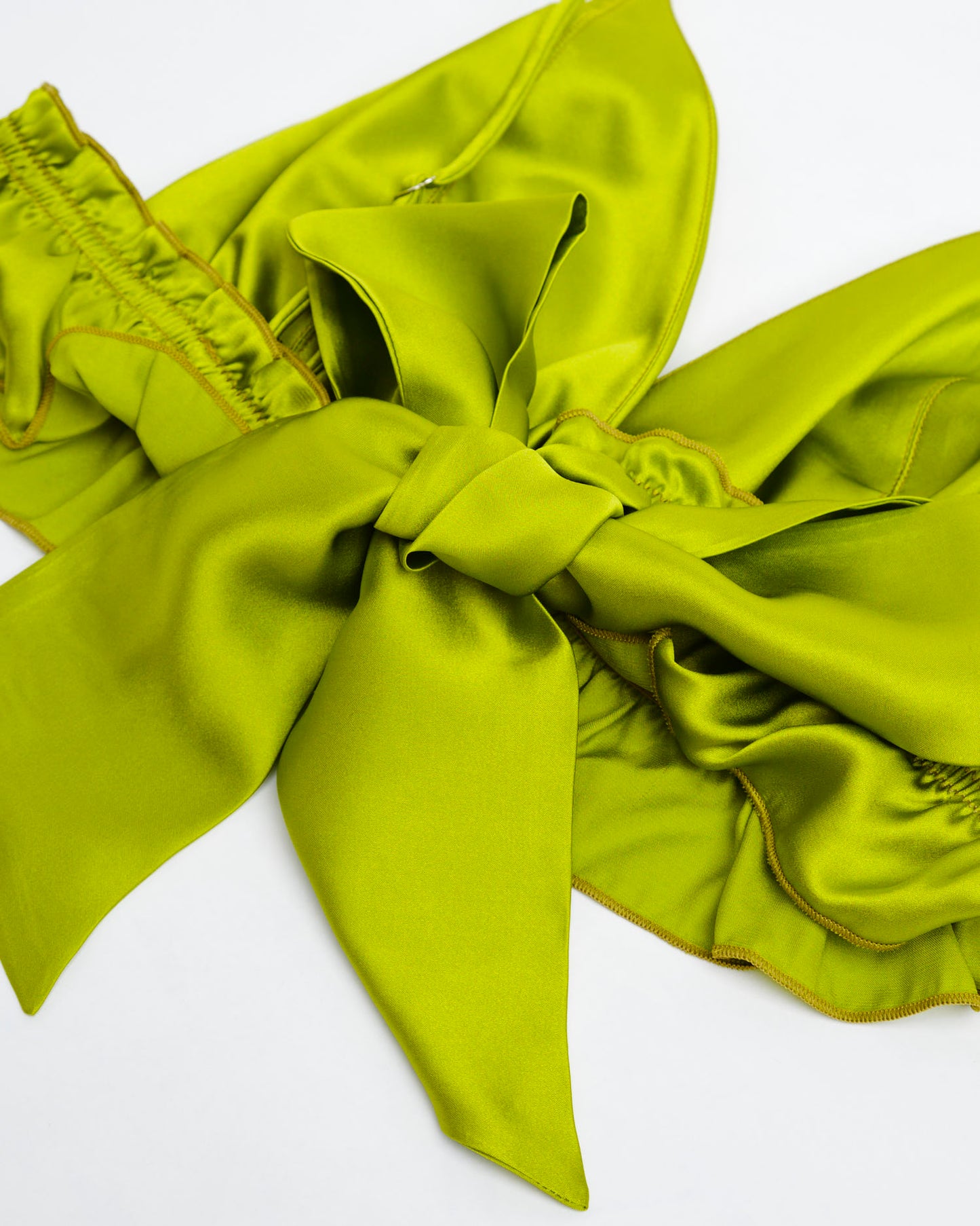 Top Memphis variante verde olio